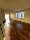 Living Room - 14025 Chadron Ave Apartments