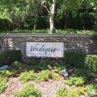 Photo - Located on a cul-de-sac, within the gated ... House