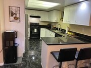 Photo - 1660 W 146th St Townhome