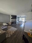 View from front door into living room and dining room - 1668 Grand Ave Townhome
