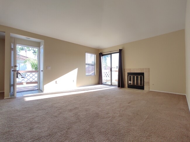 living room, to private balcony - 9428 Twin Trails Dr Unit 302