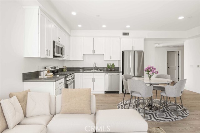 Photo - 11714 Archwood St Unit 204