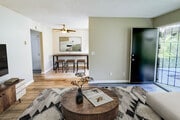 1 BR, 1 BA - Living Room - Orange Terrace Apartments