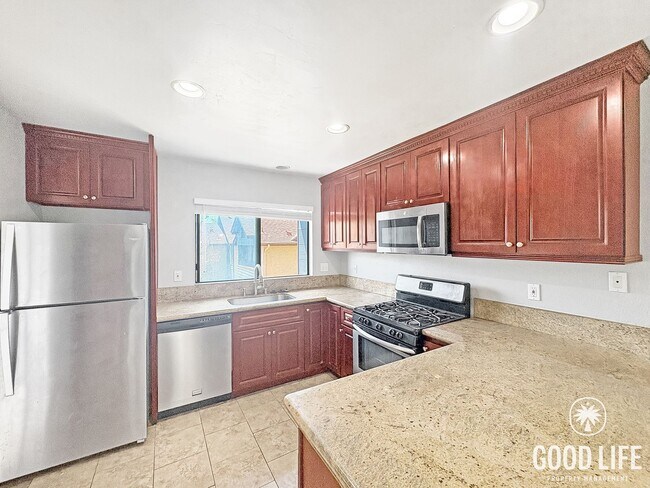 Photo - Light-Filled 2BD/2BA Top-Floor Condo in Mira Mesa with Granite Kitchen, Private Balcony & Pool
