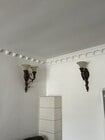 Living room wall sconces with beautiful crown molding. - 1859 1/2 Pandora Ave Unit 1
