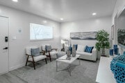 2BR, 1BA - 669SF - Living Room - 870-899 S Philadelphia St. Apartments