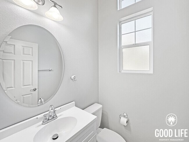 Photo - Elegant 3BR Residence in Exclusive Gated Community w/ AC & Garage!