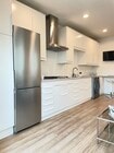 Chef's Galley Kitchen with Full size refrigerator/freezer - 206 W Maple Ave