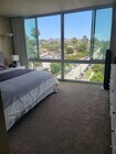 King bed, en suite full master bathroom - 4944 Cass St Condo Unit 706