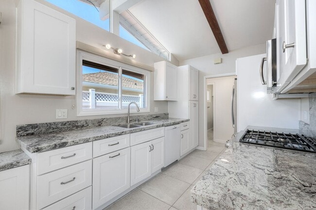 Photo - San Diego- Near Del Cerro - Refreshed 4 bed / 2 bath Home w/Solar ,A/C, Large Yard, Garage, and M...