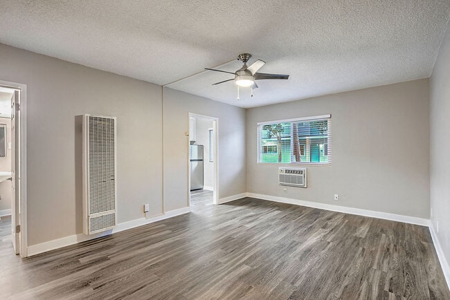 The Island Apartments unfurnished living room and window - The Island Apartments