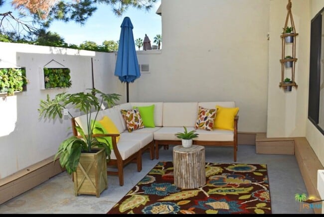 Building Photo - 48828 Desert Flower Dr