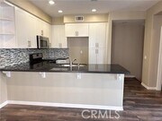 Photo - 159 E Commercial St Townhome