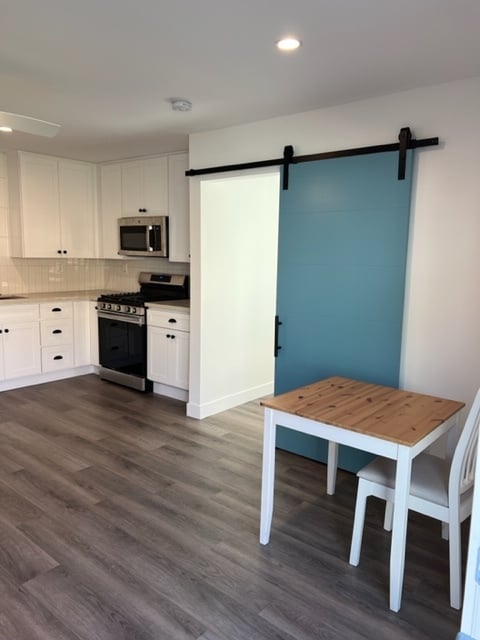 Sliding door closes off the bedroom - 3213 Maine Ave Unit A