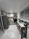 Kitchen/ living room - 124 E 135th St Unit Back