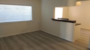 Living Room & Kitchen - 1608 260th St Apartments Unit 2