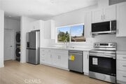 Photo - 11744 De Garmo Ave Townhome