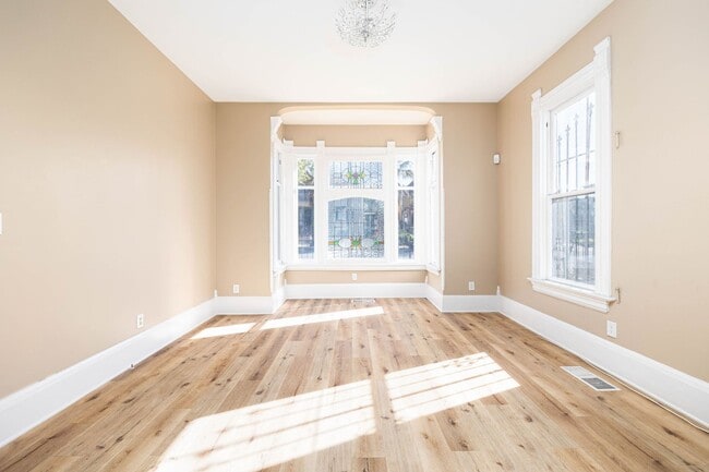 Photo - Beautiful 2bed/2bath Victorian style home with extra room for an office and bonus attic room!