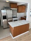 Marble countertop island... - 18771 Strathern St