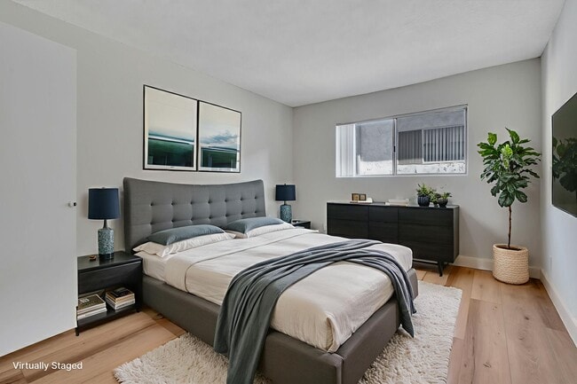 Staged bedroom - Oakhurst Apartment's