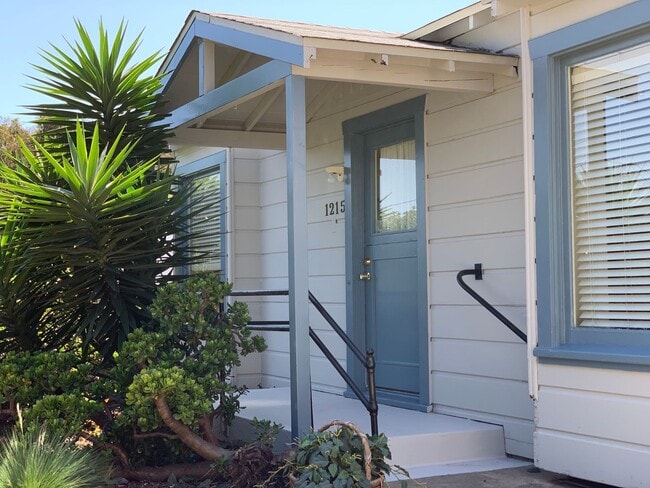 Photo - Cozy 1 bedroom cottage beach close with a yard, off street parking and a garage. Pets allowed