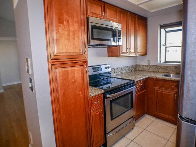 Photo - Charming 2 bed/2 bath second level condo with washer/dryer & assigned parking Unit 5