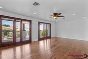 Photo - Spacious 5-Bedroom Home with Modern Amenit...