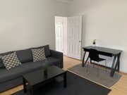 Livingroom - 1400 W Olympic Blvd Apartments Unit A