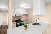 2BR, 2BA - 975SF - Kitchen - The Village at Granada Hills Apartments