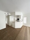 Kitchen, dining and living room - 4581 Warner Ave Condo Unit #102