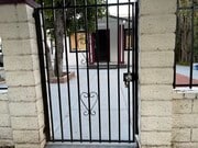Entrance gate - 14224 Friar St