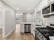 kitchen with dishwasher - 24140 Ironwood Ave Apartment Unit 1