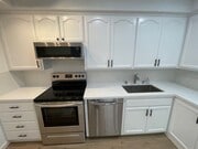 New stove and microwave - 11025 Kittridge St Apartments Unit 133