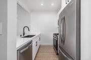 1BR + Loft, 1BA - 715SF - Kitchen - The Norman