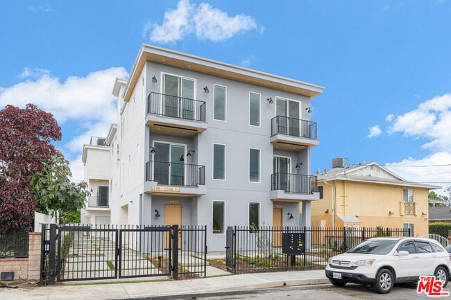 Building Photo - 5246 Auckland Ave Unit 1/4