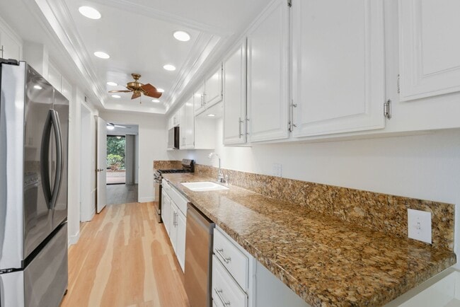 Photo - Beautiful four bedroom, three bath, townhouse available for rent. A must see.