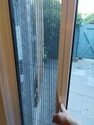 Retractable screen door on back door - 5273 Village Grn Condo Unit 5273