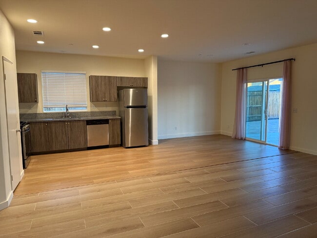 Photo - Solor Savings! Beautiful modern interior with open floorplan for entertaining. Large backyard w...