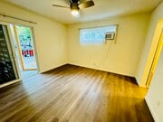 UNIT #1 PRIMARY BEDROOM - 7548 Lexington Ave Apartments