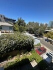This is the side view from your living room windows. - 1857 Pandora Ave Apartments Unit 1857
