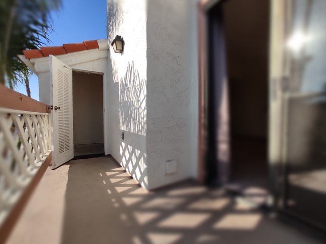storage room (bike ok) off balcony - 9428 Twin Trails Dr Unit 302
