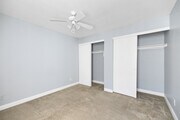 Two Bedroom One Bath - Primary Bedroom - Village Green Senior Community Apartments