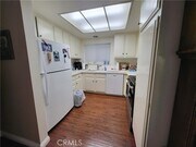 Photo - 2391 Via Mariposa W Condo Unit 1E