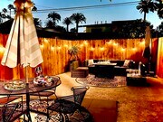 Gather and relax around the fire pit table. - 2824 S Orange Dr