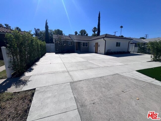 Photo - 7669 Beeman Ave Townhome