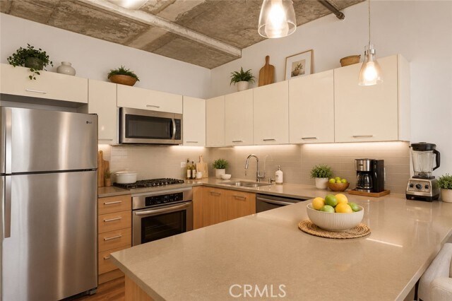 Photo - 645 W 9th St Unit 314