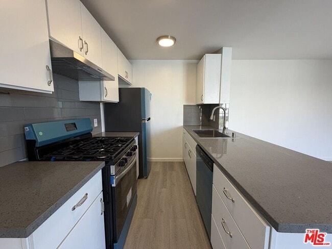 Building Photo - 1531 N Detroit St Unit 214