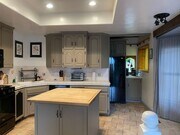Photo - Large home level entry with garage.