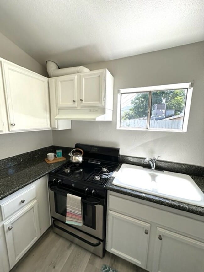 Photo - 2+1 Bungalow Cottage- central a/c, carport, patio, washer/dryer hookups, pet friendly