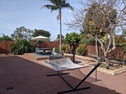 Private comfy backyard, with fire pit and hammock. - 4848 Diane Ave